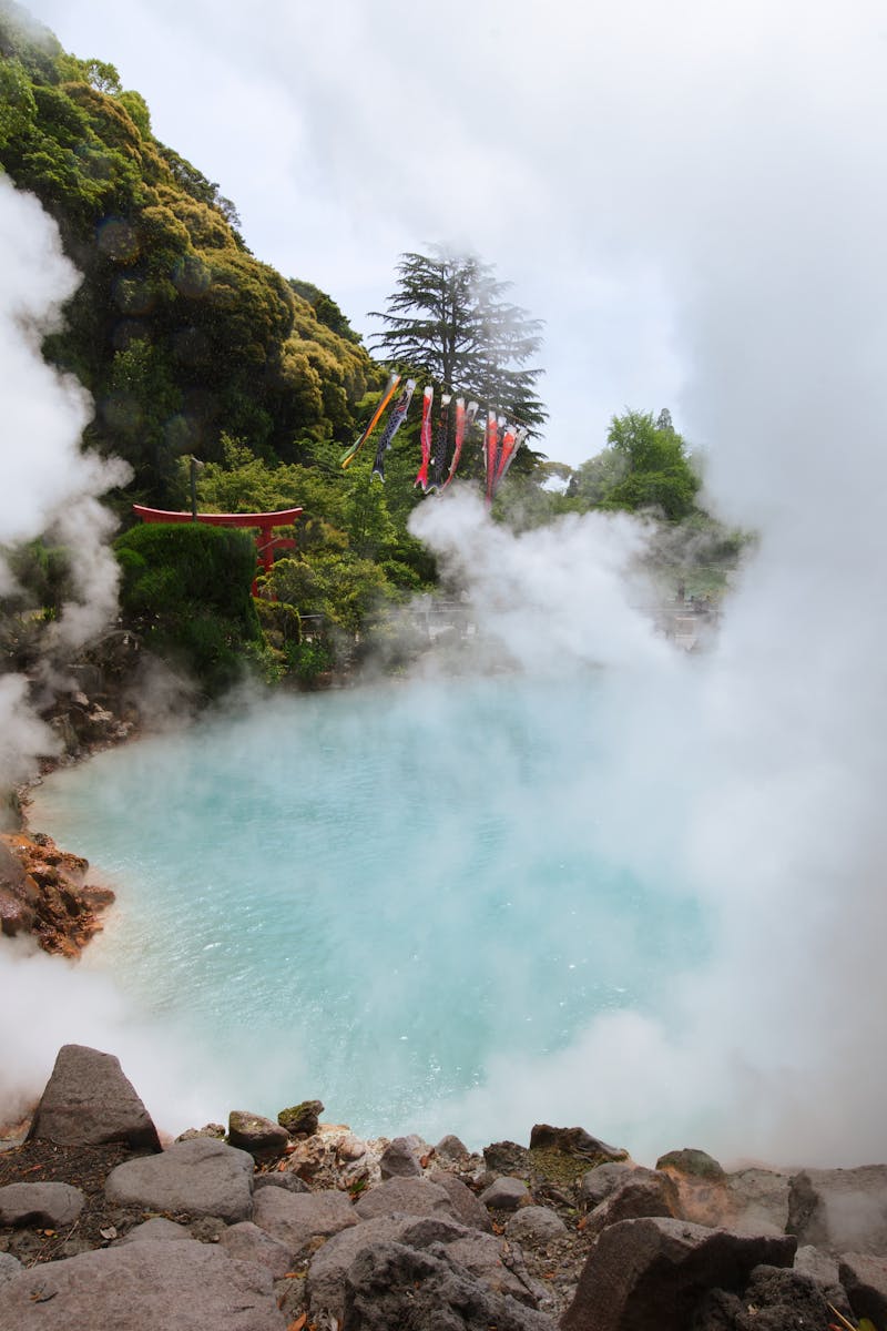 Geothermal hot spring with steam and rocky surroundings in Beppu, Japan, famous for its hot spring hells.